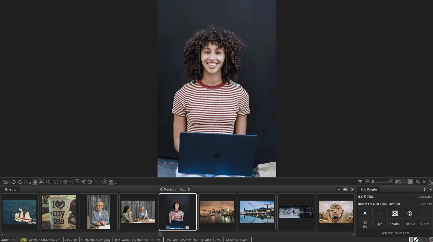 ACDSee Photo Studio View mode with a detected face on a portrait and a filmstrip below