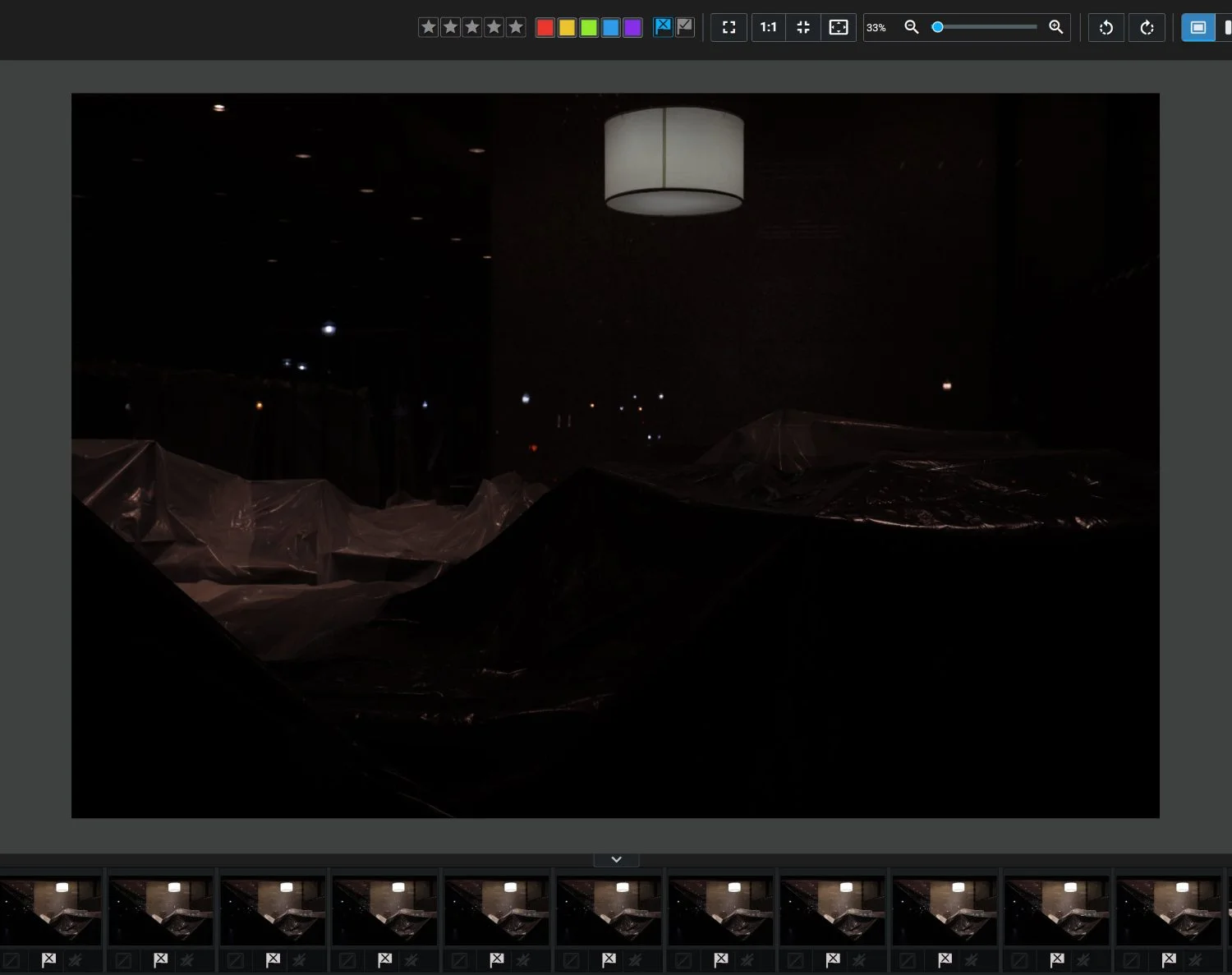 Photography culling software with a preview of an underexposed image displayed